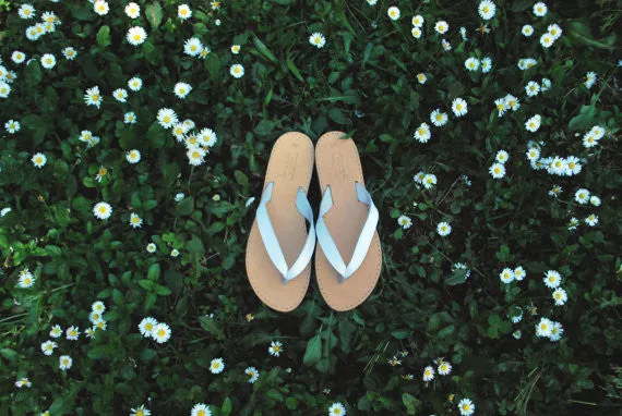 Comfortable white flip flops